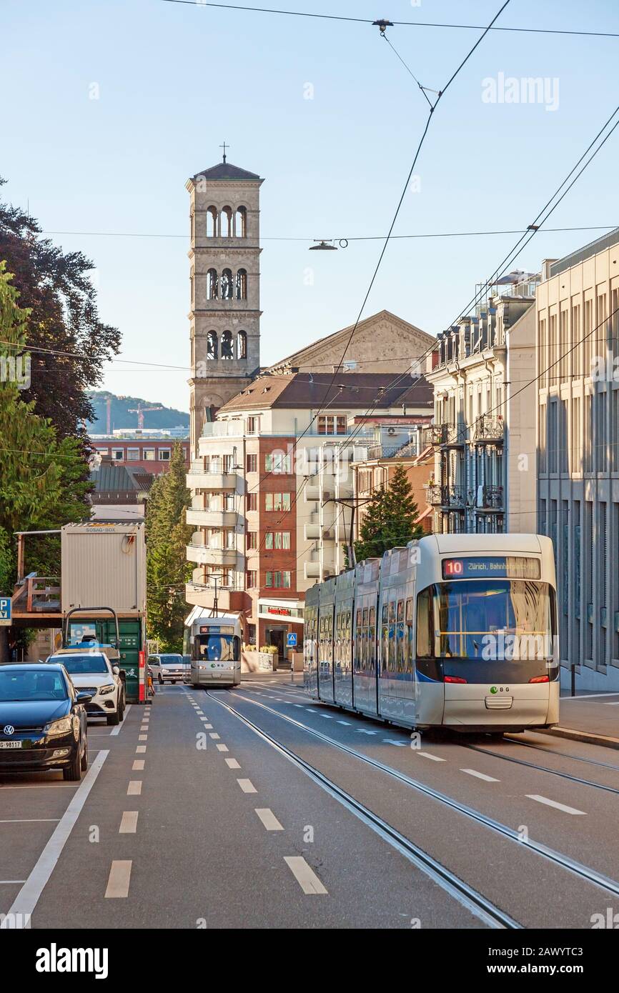 Zurich, Switzerland - June 10, 2017: Street 'Leonhardstrasse', tram in foreground, church 'Liebfrauen' in background Stock Photo
