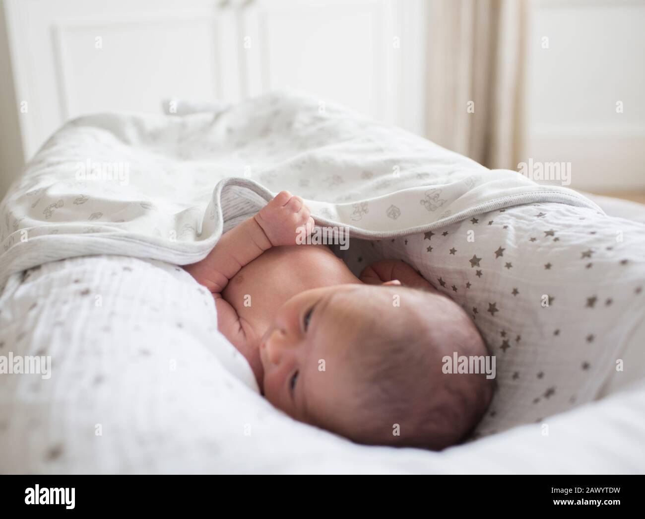 Newborn baby boy laying in Stock Photo Alamy