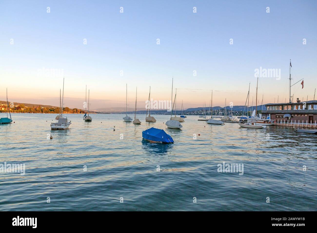 Lake Zurich (Zurichsee) at evening - boats in front Stock Photo