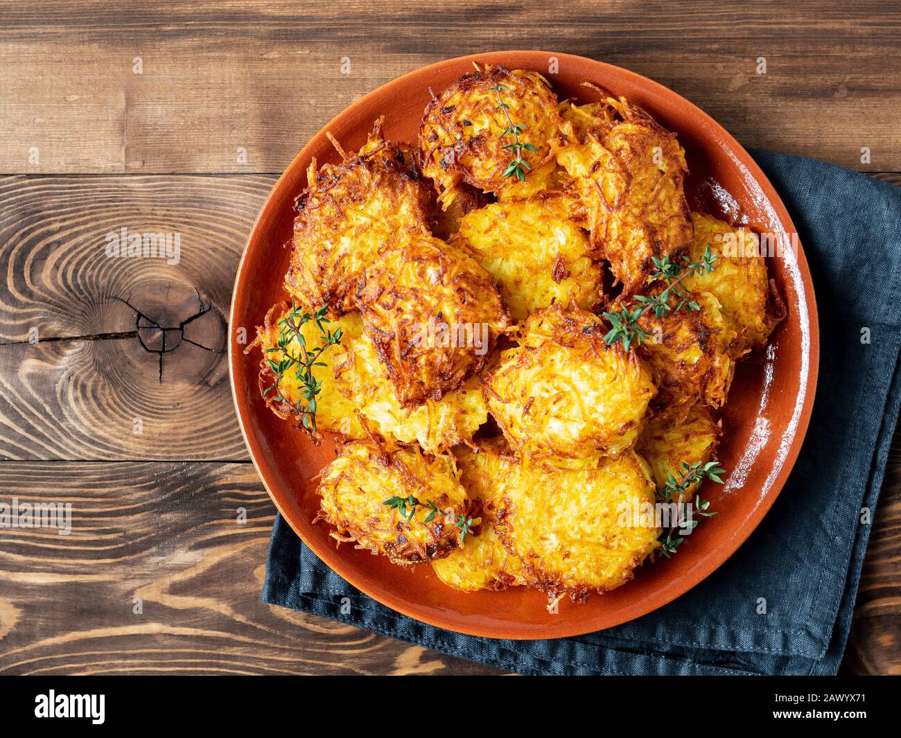 Potatoes pancakes latkes, flapjacks, hash brown or potato vada on brown