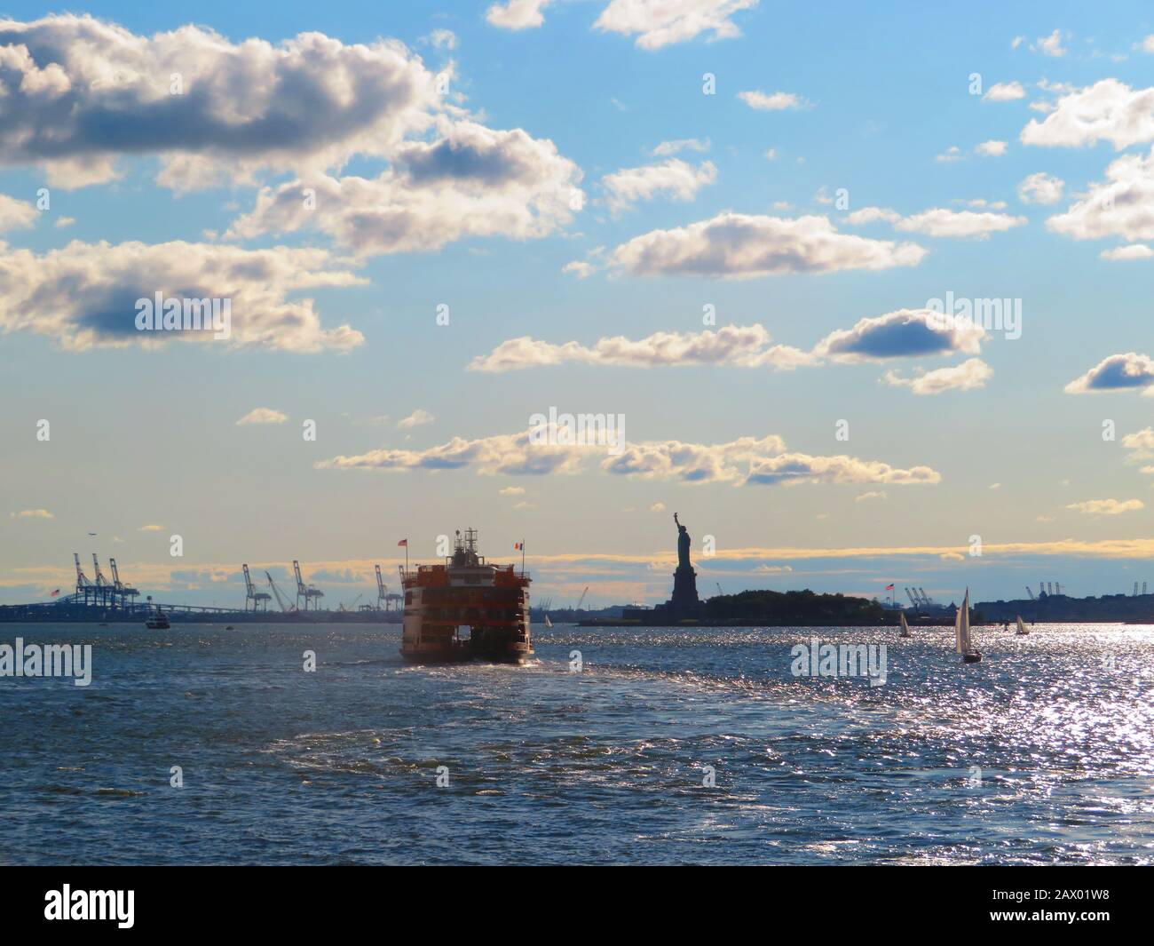 Staten Island Ferry passing the Statue of Liberty, New York Stock Photo