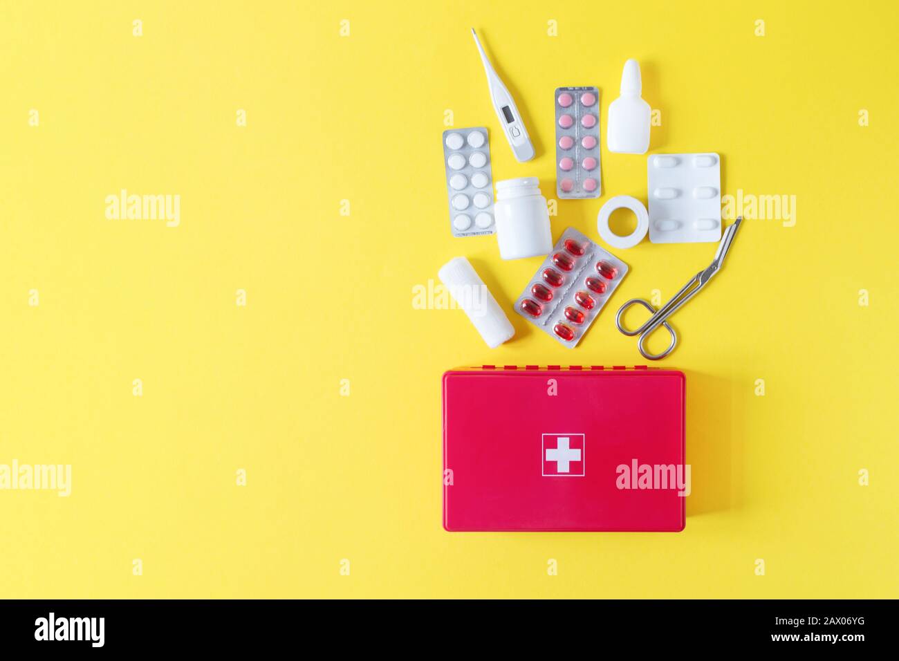 First aid kit red box with medical equipment and medications for ...