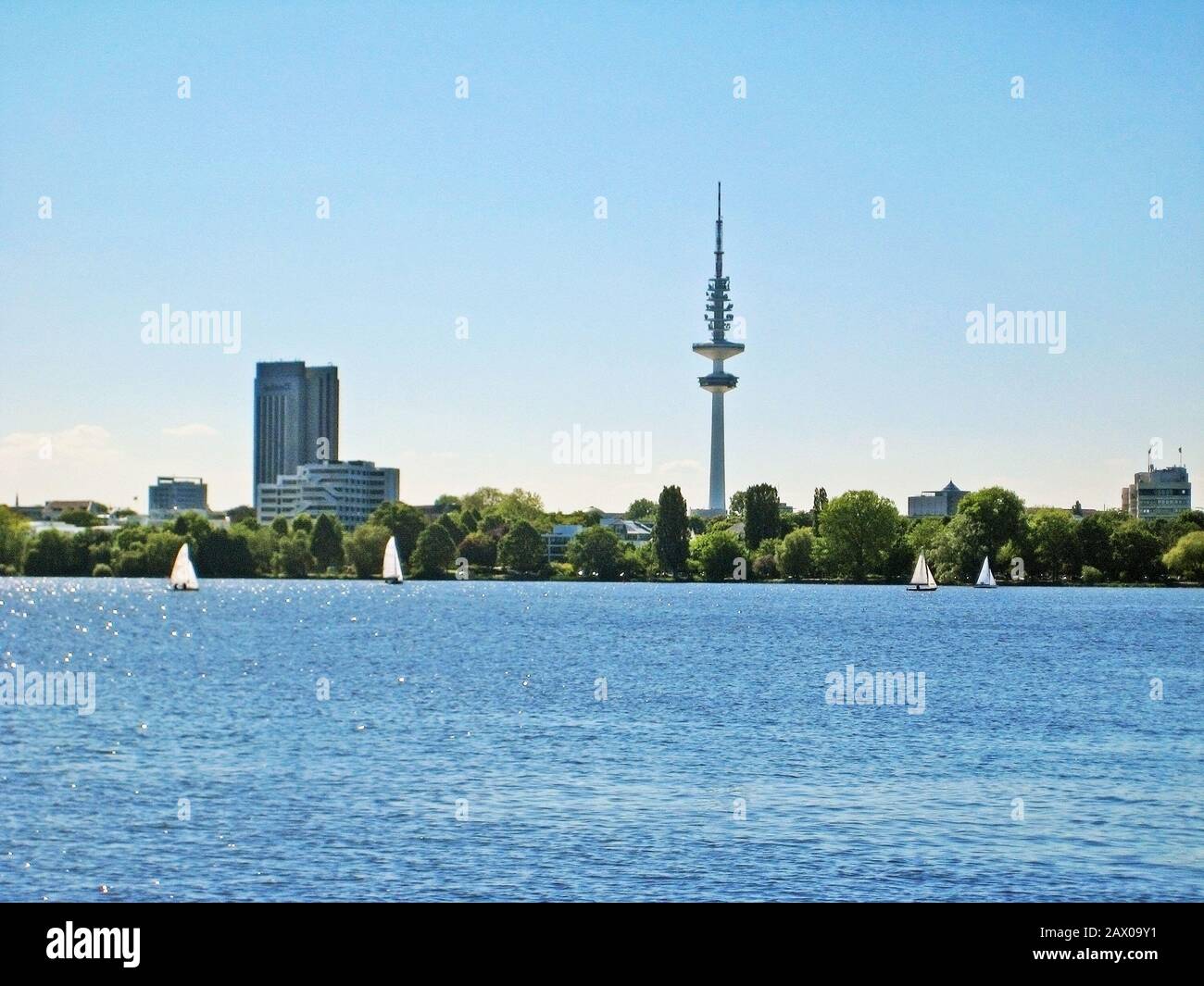 Hamburg lake Aussenalster with sailing boats - skyline of Hamburg ...