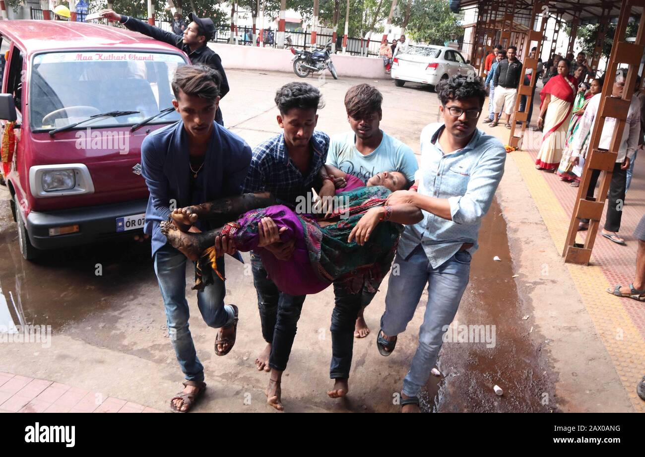 Odhisa. 10th Feb, 2020. People carry an injured woman in Ganjam District of India's eastern state of Odisha, Feb. 9, 2020. At least nine people died of electrocution and 22 others were injured in India's eastern state of Odisha when a moving bus came in contact with an 11 KV live transmission wire on Sunday, confirmed a senior district administration official to Xinhua via phone. Credit: Xinhua/Alamy Live News Stock Photo