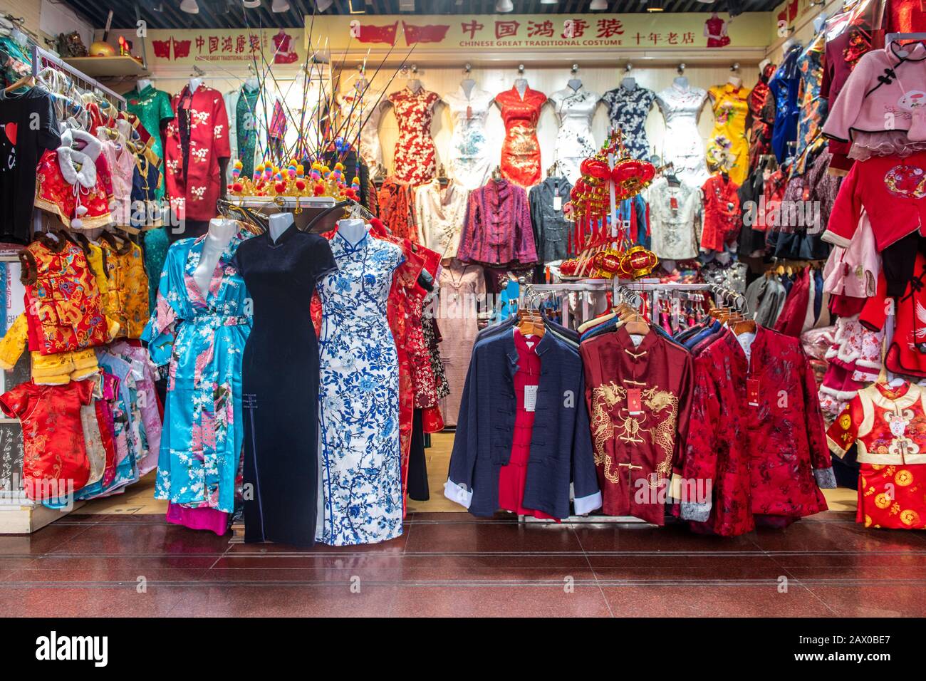 A store featuring a variety of colorful traditional apparel for women,  Shanghai, China Stock Photo - Alamy