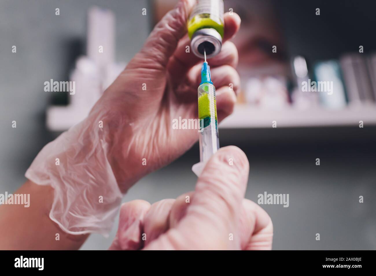 The doctor cosmetologist makes the biorepil facial injections procedure ...