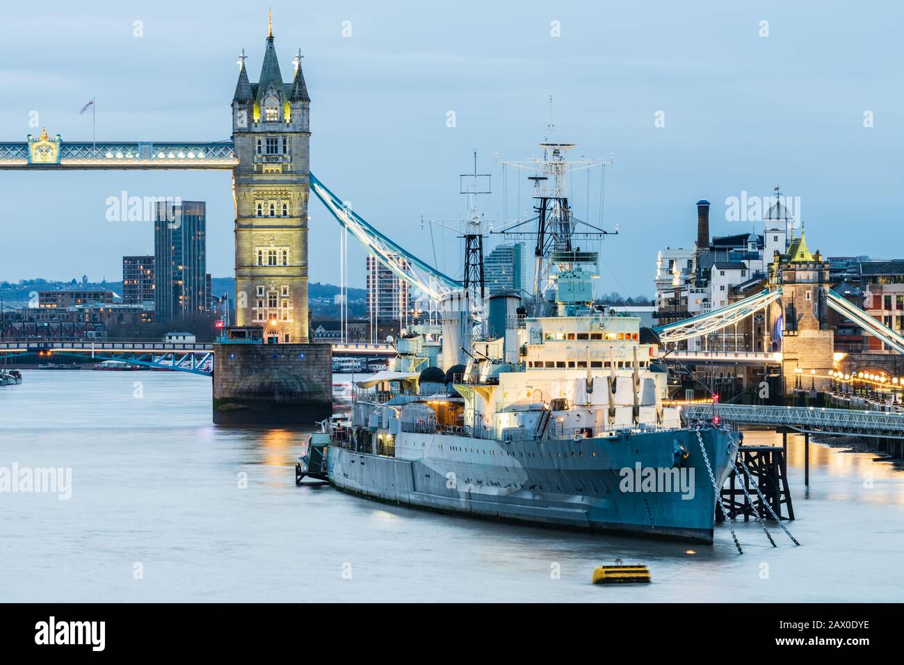 HMS Belfast and Tower Bridge on the River Thames in London Stock Photo