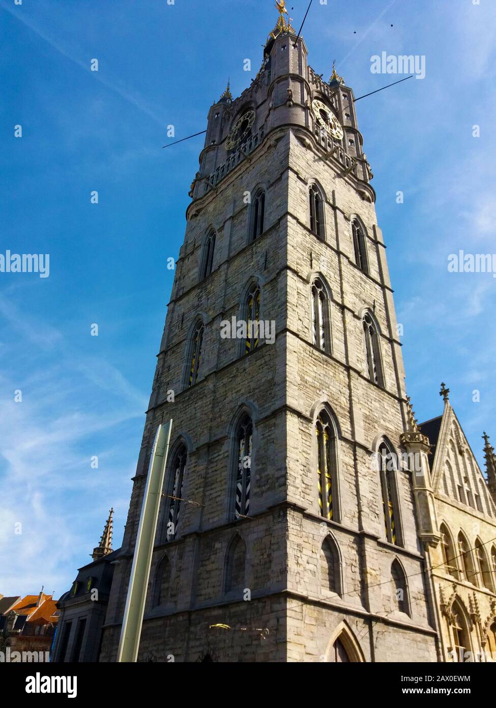 GENT, BELGIUM- 03.25.2017 Belfries tower of Ghent, an old medieval tower in the city center. Fortified Beffry tower. Stock Photo