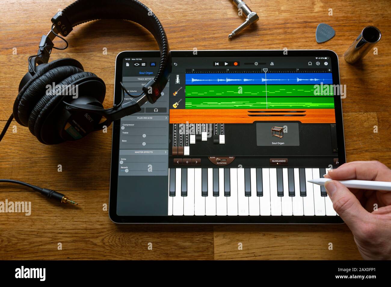 BATH, UK - FEBRUARY 10, 2020: GarageBand music making application being used to compose a song on an Apple iPad Pro in a home environment. Stock Photo
