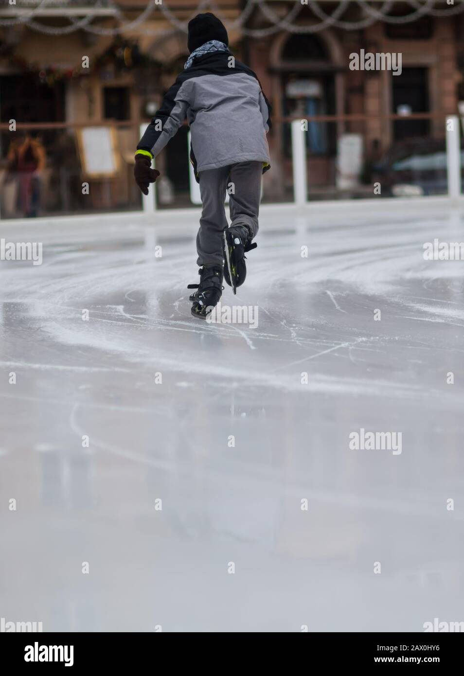 young boy skating on the ice rink Stock Photo Alamy
