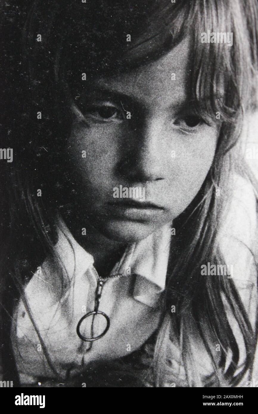 Fine 1970s black and white vintage photography of young blond girl