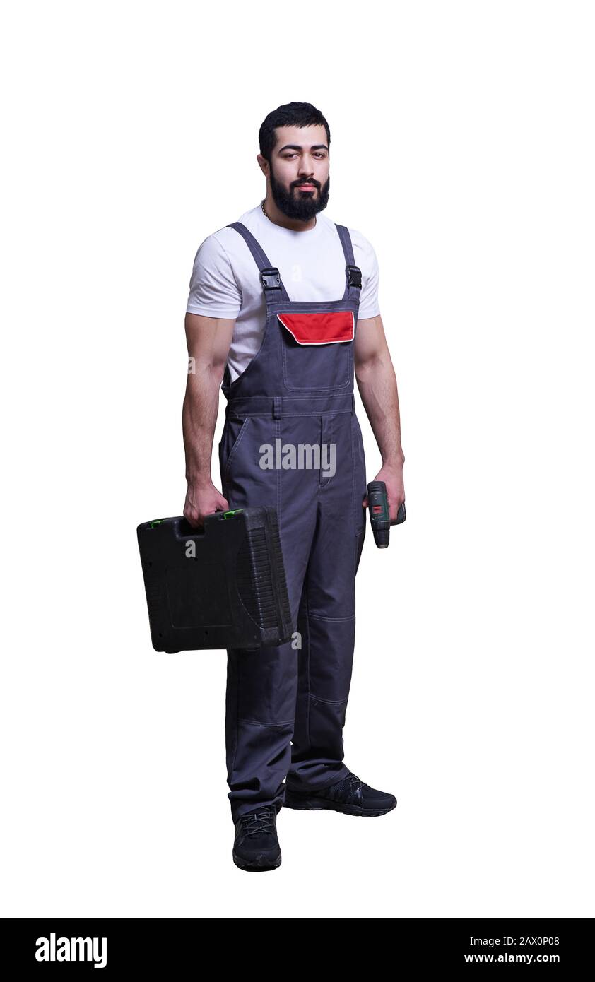smiling worker with red drill on white background Stock Photo