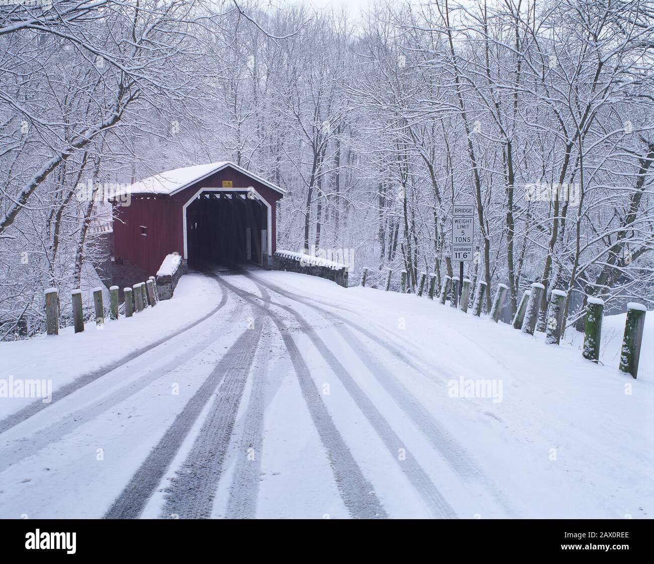 Kurtz's Mill Covered Bridge after snowfall. Lancaster County Central Park, Lancaster County, Pennsylvania, winter. Stock Photo