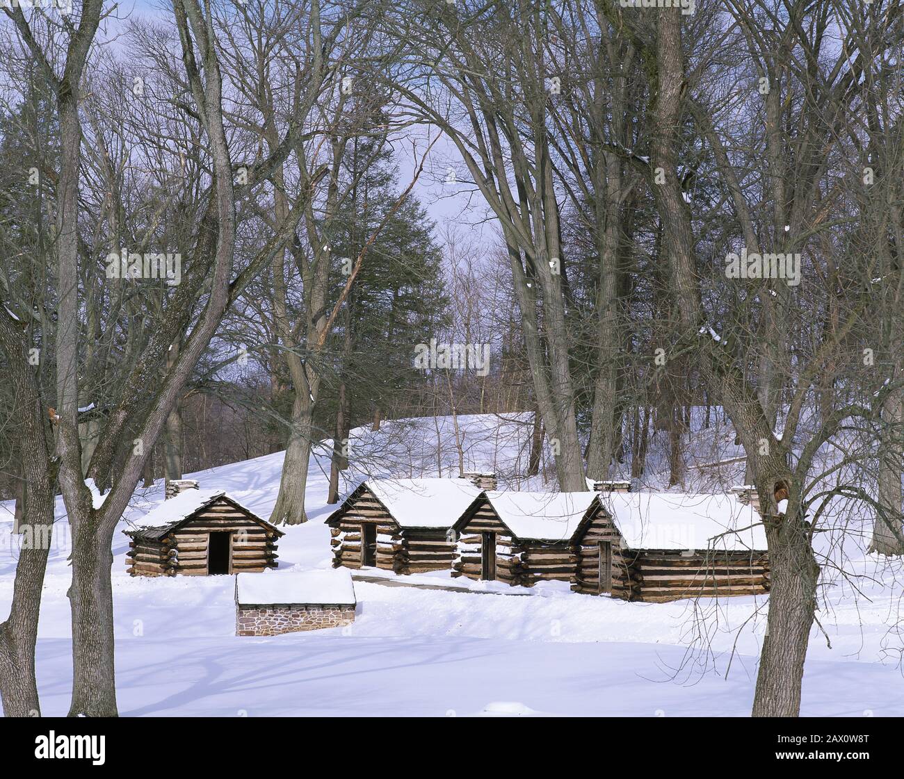 Continental Army cabins after snow.  George Washington troops took shelter in these and other cabins winter of 1777-78. Valley Forge National Historic Stock Photo