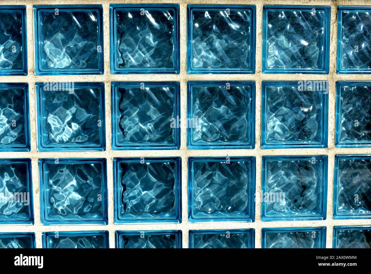 Blue glass bricks background. Blue glass bricks texture. Stock Photo