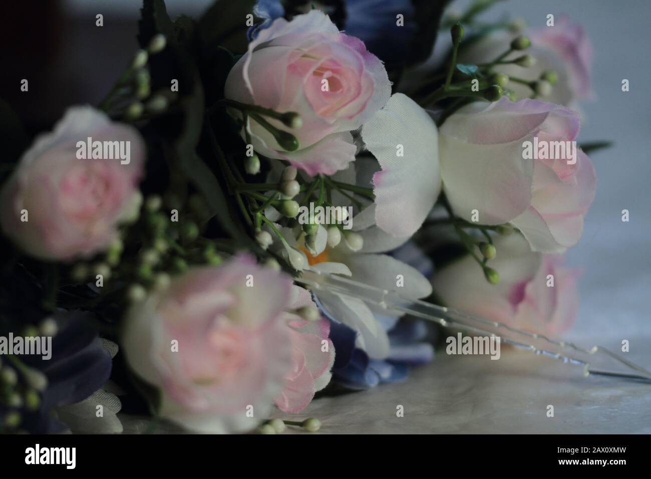 bouquet of artificial roses and gypsophila Stock Photo Alamy