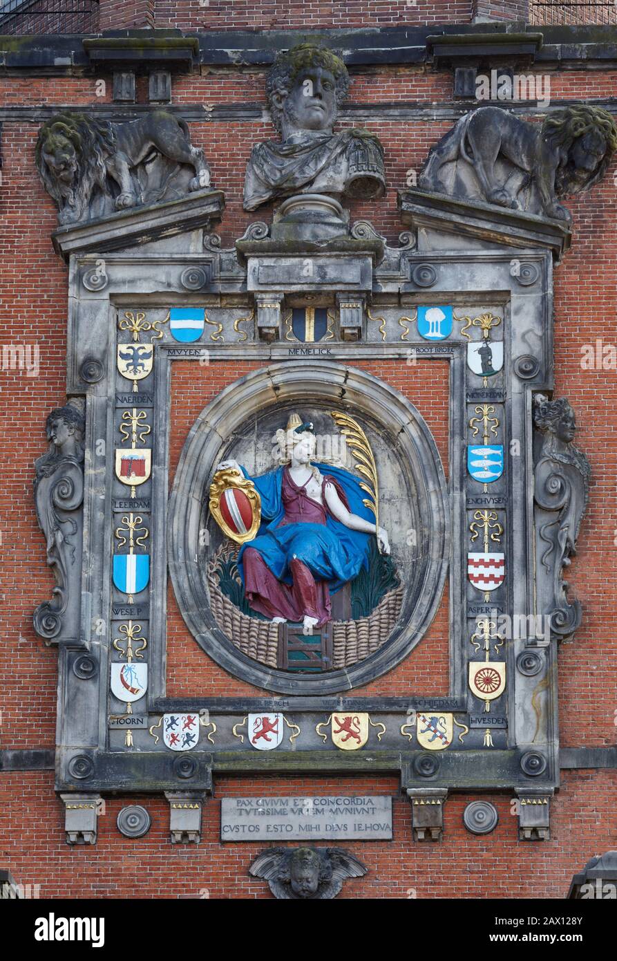 Maiden of Dordrecht (1618) depicted on the Groothoofdspoort, the former main City Gate, in Dordrecht, Netherlands. Stock Photo