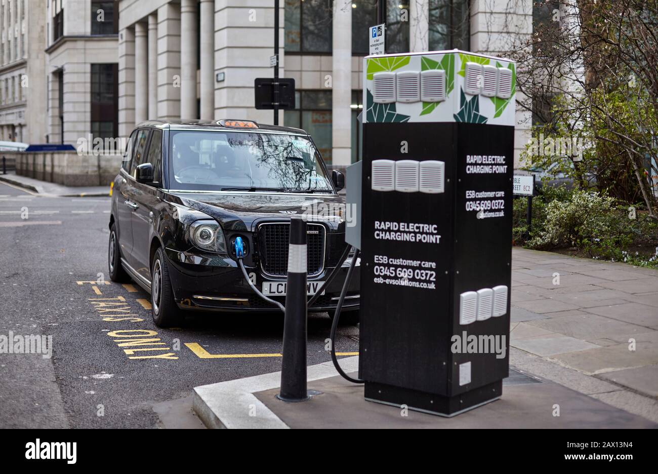 London Black Cab, TX Electric Taxi from LEVC at a RApd Electric charging point Central London. Stock Photo