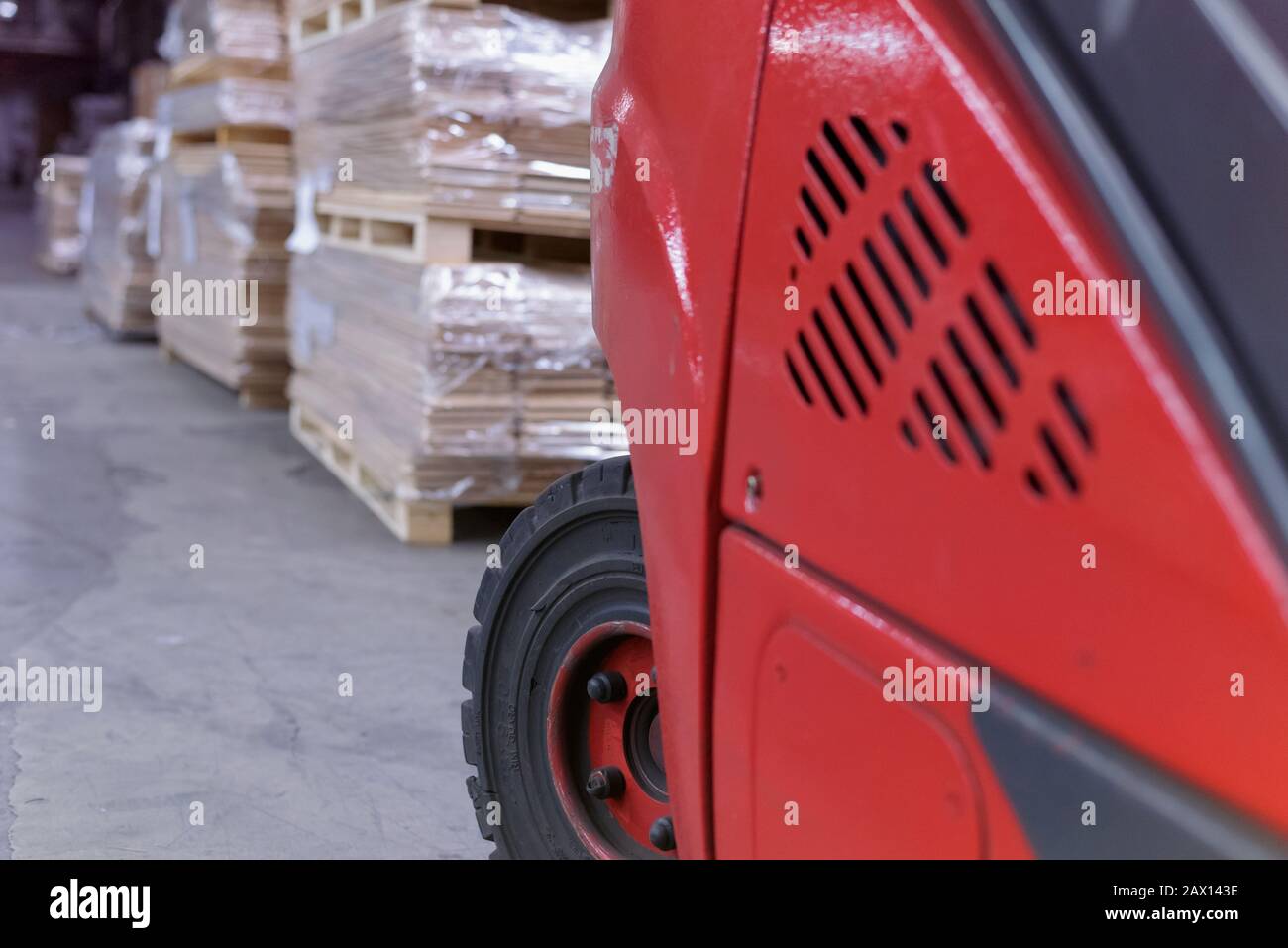 Timber Flooring Factory. Pile of cut wood in factory storage warehouse
