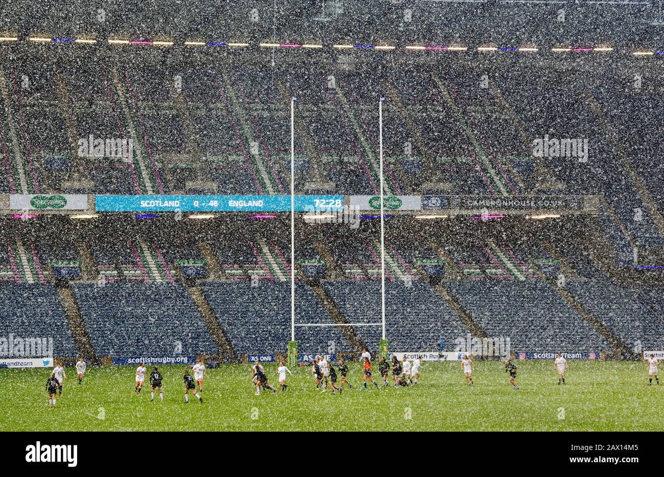 A general view of action as heavy snow falls during the Women's Six ...