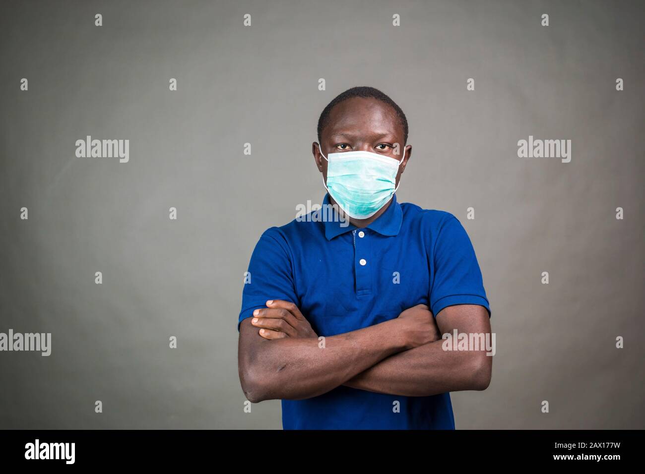 young black man wearing a medical face mask Stock Photo Alamy