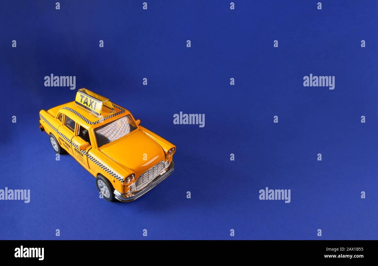 Model of yellow retro New York city taxi cab. Stock Photo
