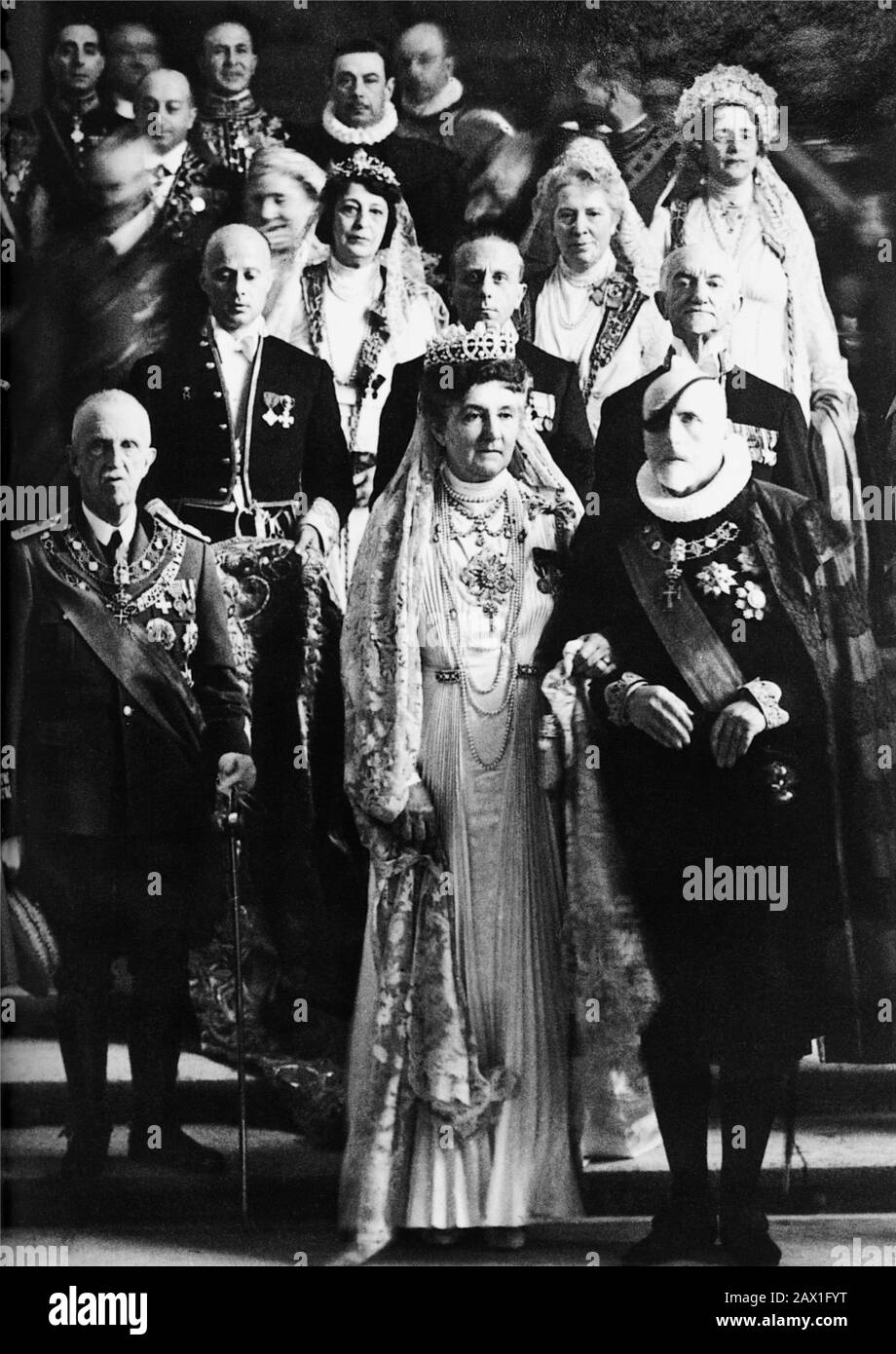 1939 , 12 march, ROMA , ITALY : The italian Prince ALESSANDRO RUSPOLI di CERVETERI ( Roma 1866 - 1942 ), Gran Maestro del Sacro Ospizio Apostolico , grandfather of scandalous prince of Dolce Vita Dado Ruspoli ( 1924 - 2005 ). In this photo excort the  during the coronation of new Pope PIO XII Pacelli  with King VITTORIO EMANUELE III and Queen ELENA ( Helena , Héléne of Montenegro ) of Italy . Behind the King of Italy , the prince DUCA di BERGAMO ADALBERTO di SAVOIA GENOVA ( Torino 1898 - 1982 ). The principe Alessandro Ruspoli married in 1897 Donna Marianita Lante Montefeltro della Rovere , da Stock Photo