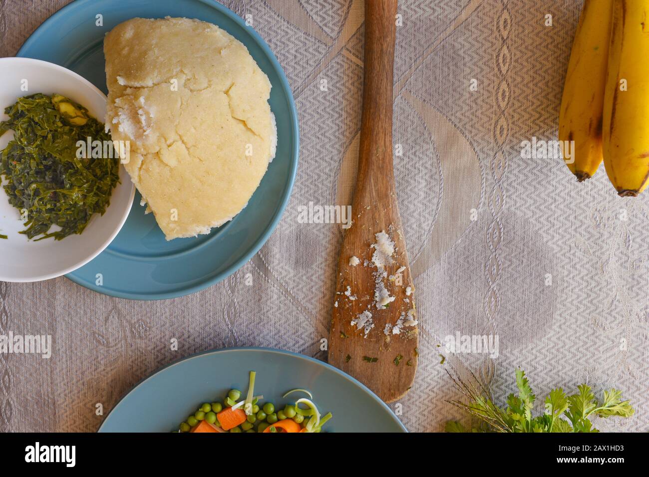 a plate of ugali and sukuma from above Stock Photo
