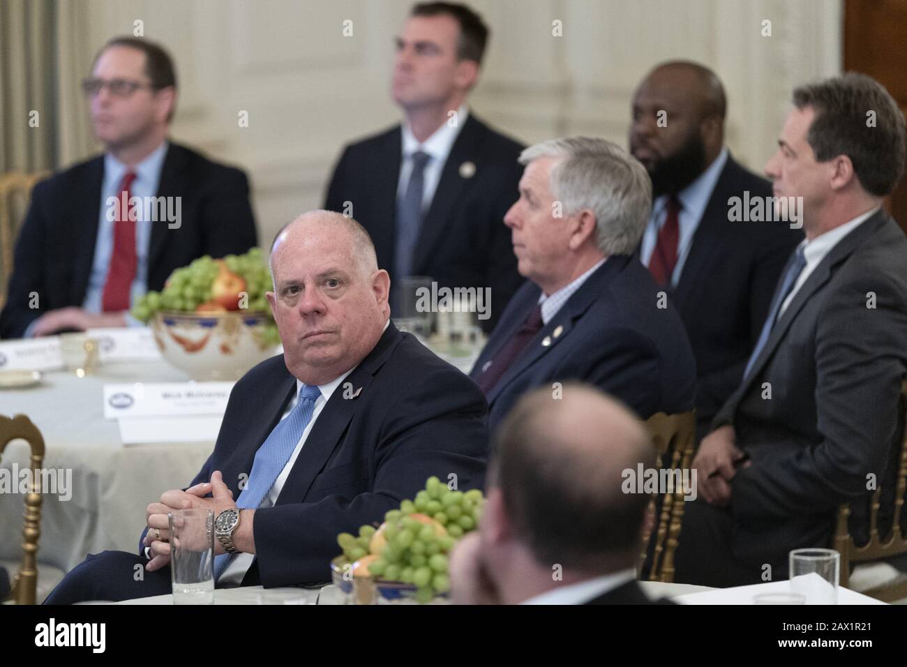 Washington, United States. 10th Feb, 2020. Gov. Larry Hogan, R-MD, listens as President Donald J. Trump speaks to a group of governors during the National Governor's Association meetings, at the White House in Washington, DC on Monday, February 10, 2020. Pool photo by Chris Kleponis/UPI Credit: UPI/Alamy Live News Stock Photo