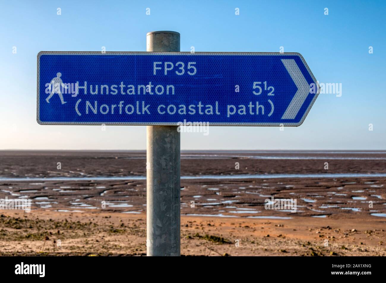 Signpost for the Norfolk Coastal Path, FP35, along the east coast of The Wash at Snettisham. Stock Photo