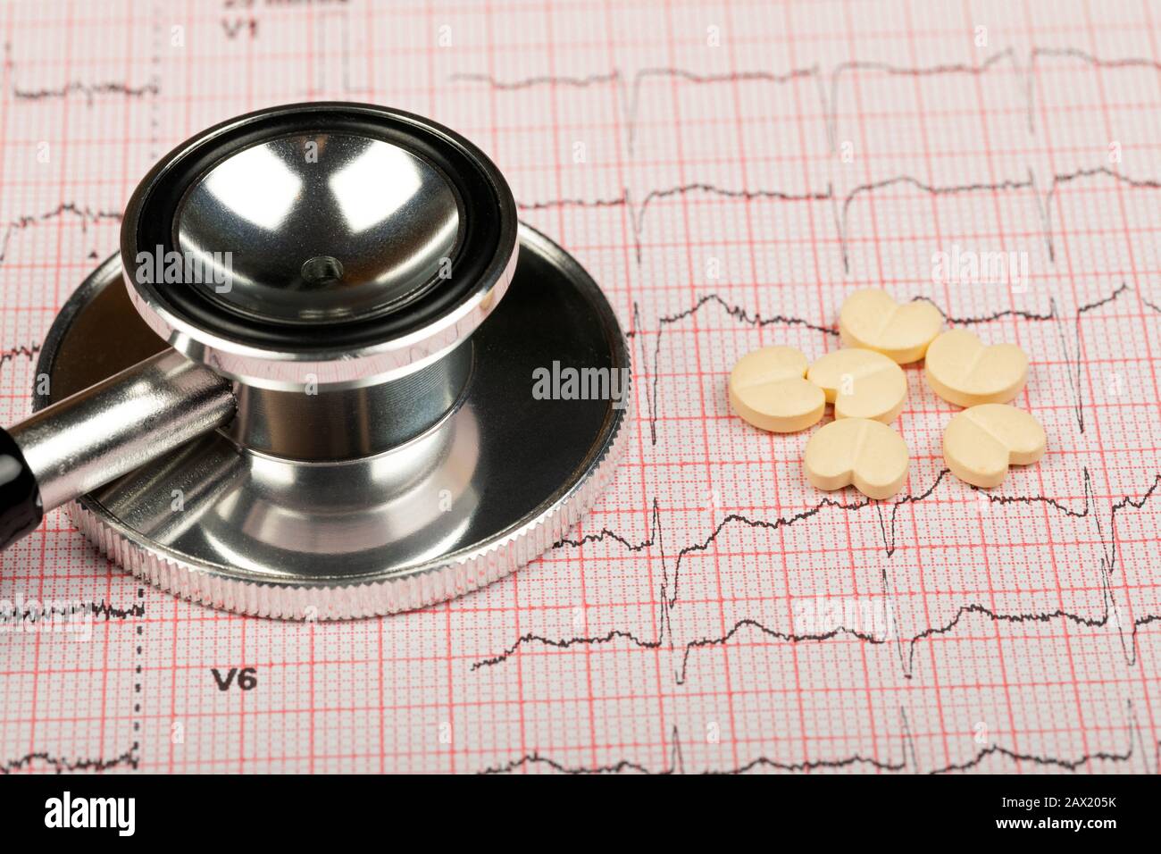 Electrocardiogram graph report with stethoscope on it Stock Photo