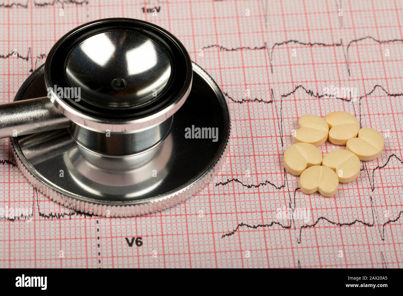 Electrocardiogram graph report with stethoscope on it Stock Photo