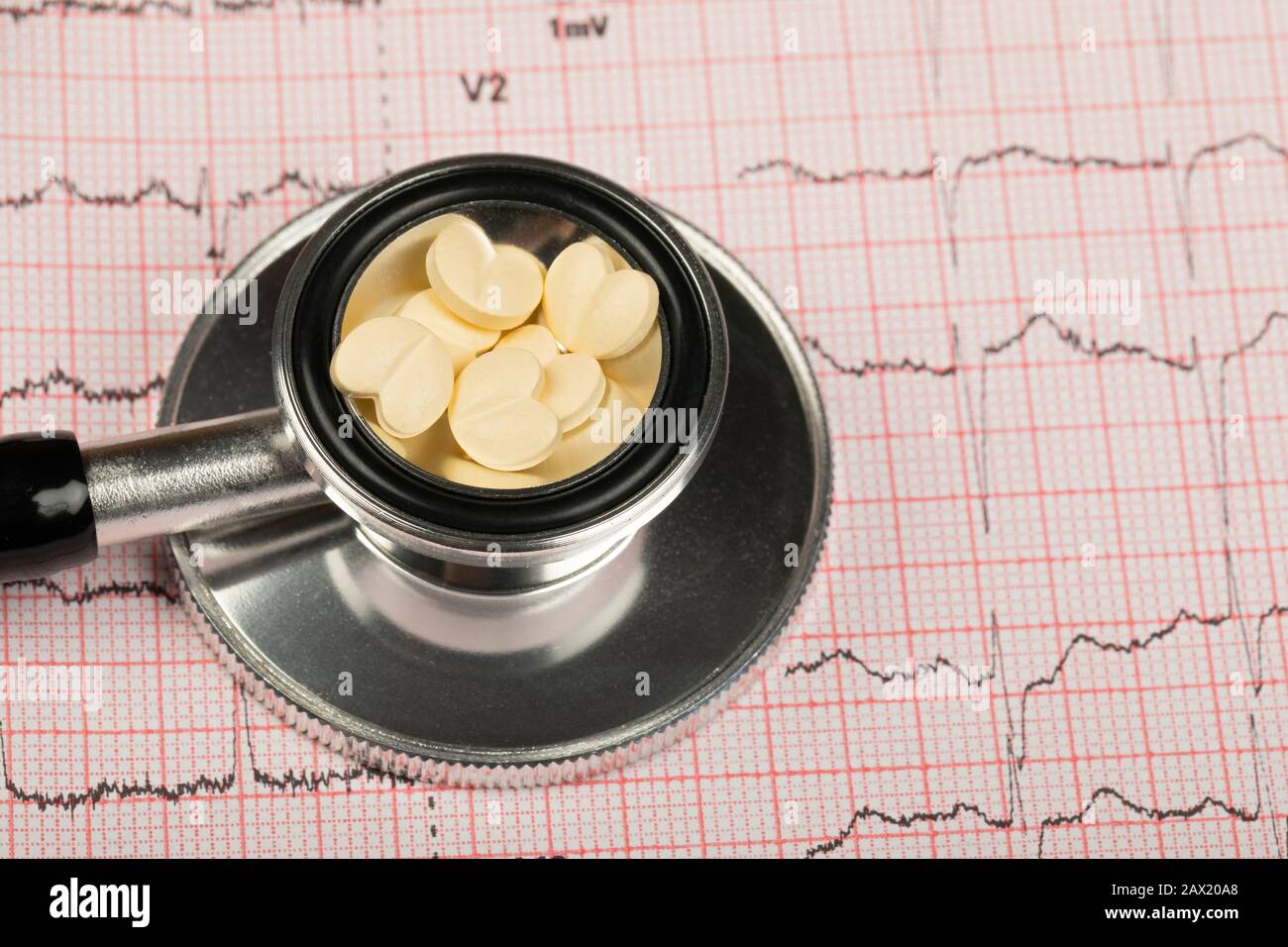 Electrocardiogram graph report with stethoscope on it Stock Photo