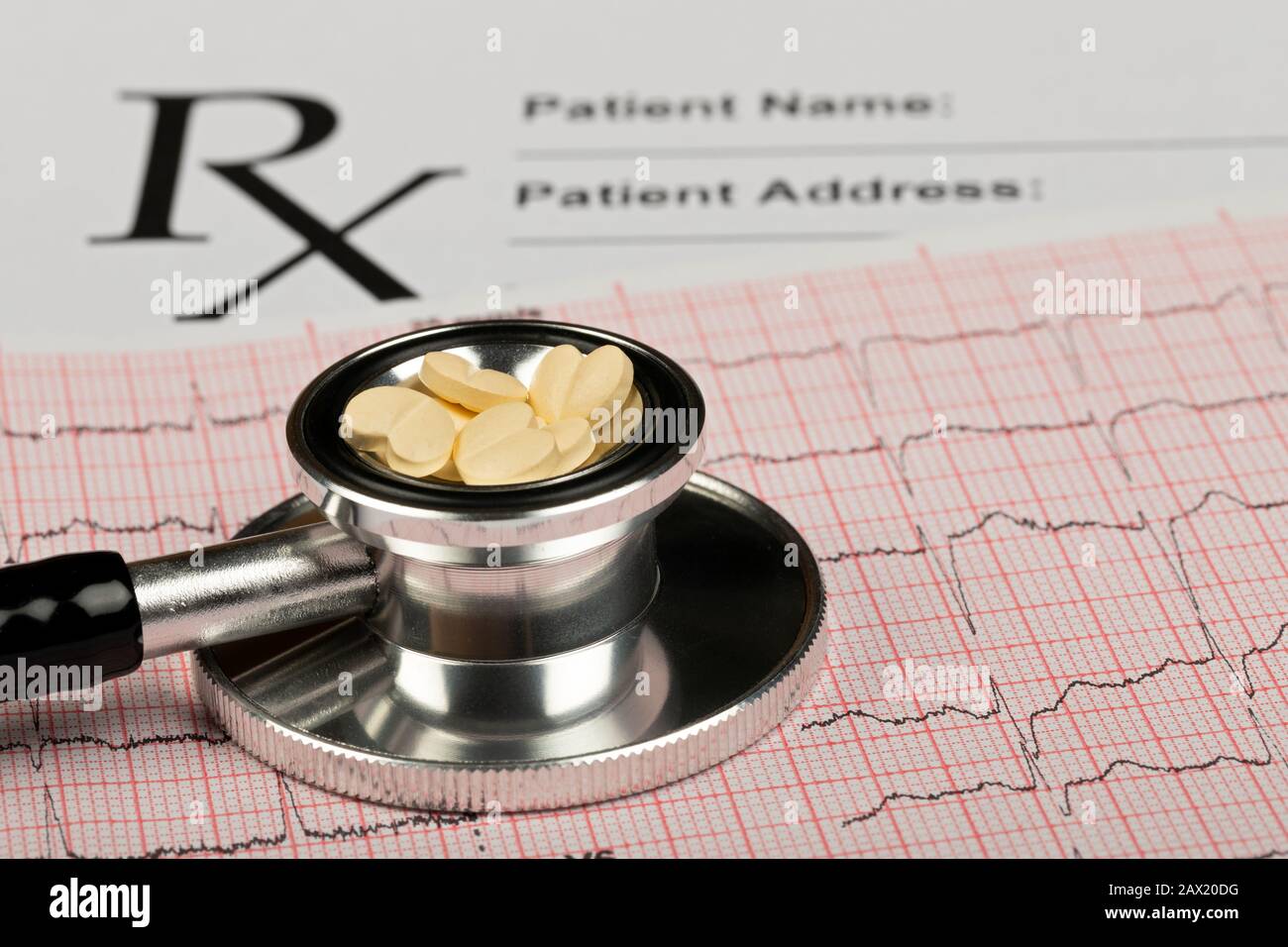 Electrocardiogram graph report with stethoscope on it Stock Photo