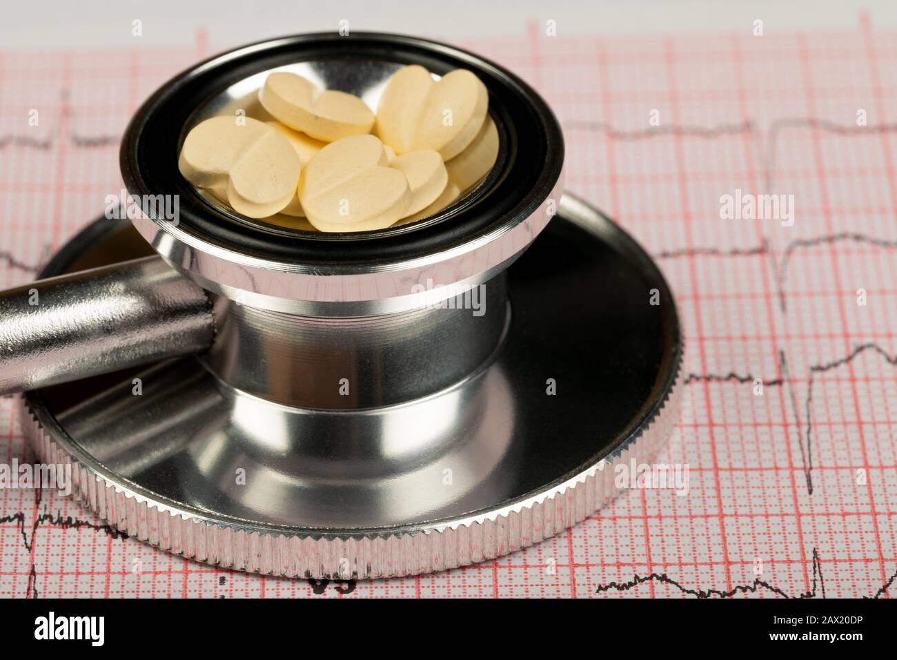 Electrocardiogram graph report with stethoscope on it Stock Photo
