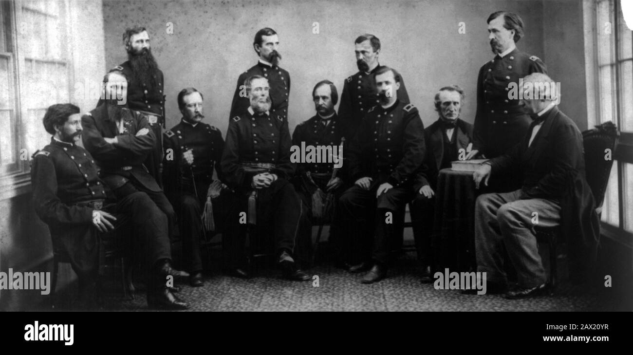 1865, USA :  Military commission that tried and convicted the Lincoln conspirators. Portrait includes, standing left to right: Brig. General Thomas M. Harris , Maj. General Lew Wallace , Maj. General August V. Kautz  and Henry L. Burnett. Seated left to right: Lt. Col. David R. Clendenin, Colonel C.H. Tompkins, Brig. General Albion P. Howe,  Brig. General  James Ekin , Major General David Hunter , Brig. General Robert S. Foster , John A. Binham  and Brig. General Joseph Holt. Photo by Alexander GARDNER ( 1821 - 1882 ).  The U.S.A. President ABRAHAM LINCOLN ( 1809 - 1865 ).  -  Presidente della Stock Photo