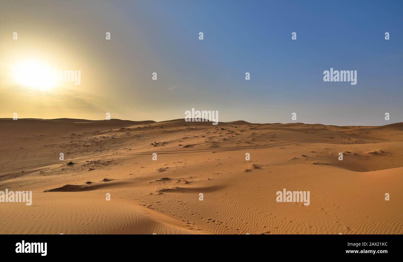 Beautiful sunset in the desert, wahiba sands Oman Stock Photo