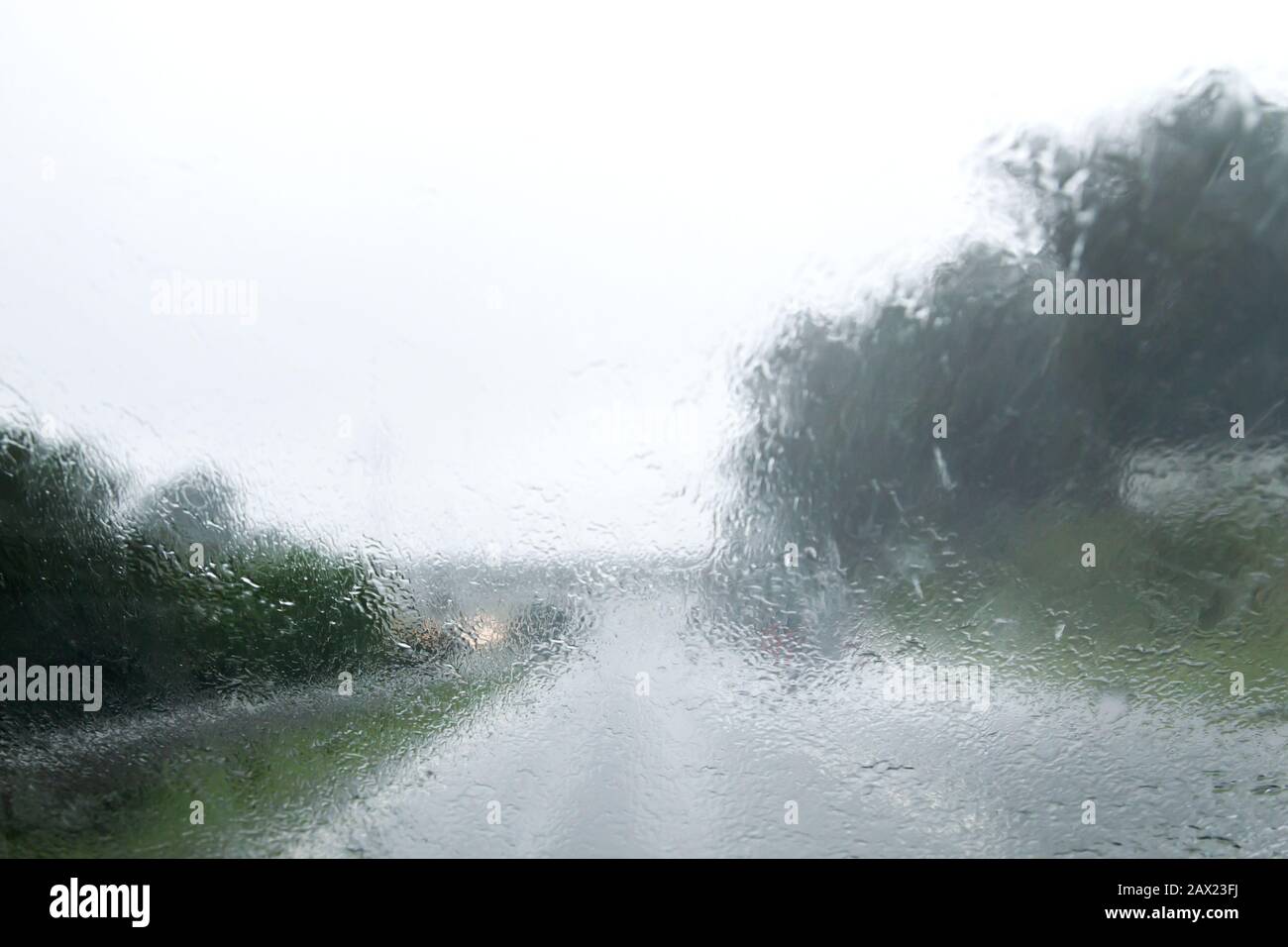Driving on a highway with rain Stock Photo