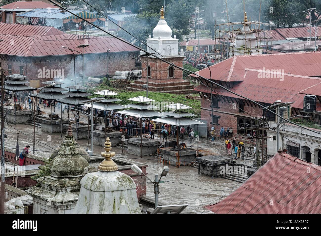 Funeral pyres are tended for many hours until cremated corpses are