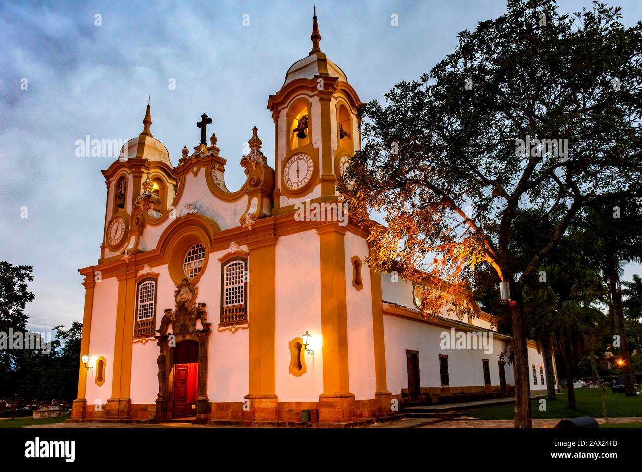 Facade of an old church built in the 18th century in baroque style in the famous city of Tiradentes, Minas Gerais at dusk Stock Photo