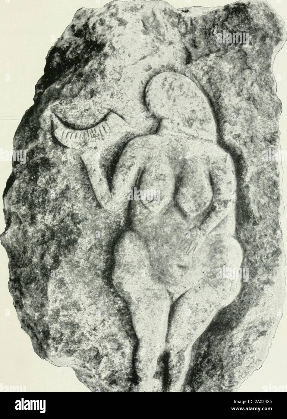 An introduction to the study of prehistoric art . ^ (Plate VI).  female statuette, recalling somewhat that discoveredat Brassempouy, but more complete, comes from the caveof Baousse-Rouss6 at Mentone. It is sculptured in ayellow slightly translucent steatite, and shows head, trunk,and thighs. The head is oval in shape, but no facialfeatures are shown. The forehead is retreating, and athick mass of hair falls on the neck much like that of somearchaic Greek statues (Fig. 53). Three or four otherstatuettes are said to have been found at Mentone, butgreat scepticism has been expressed regarding t Stock Photo