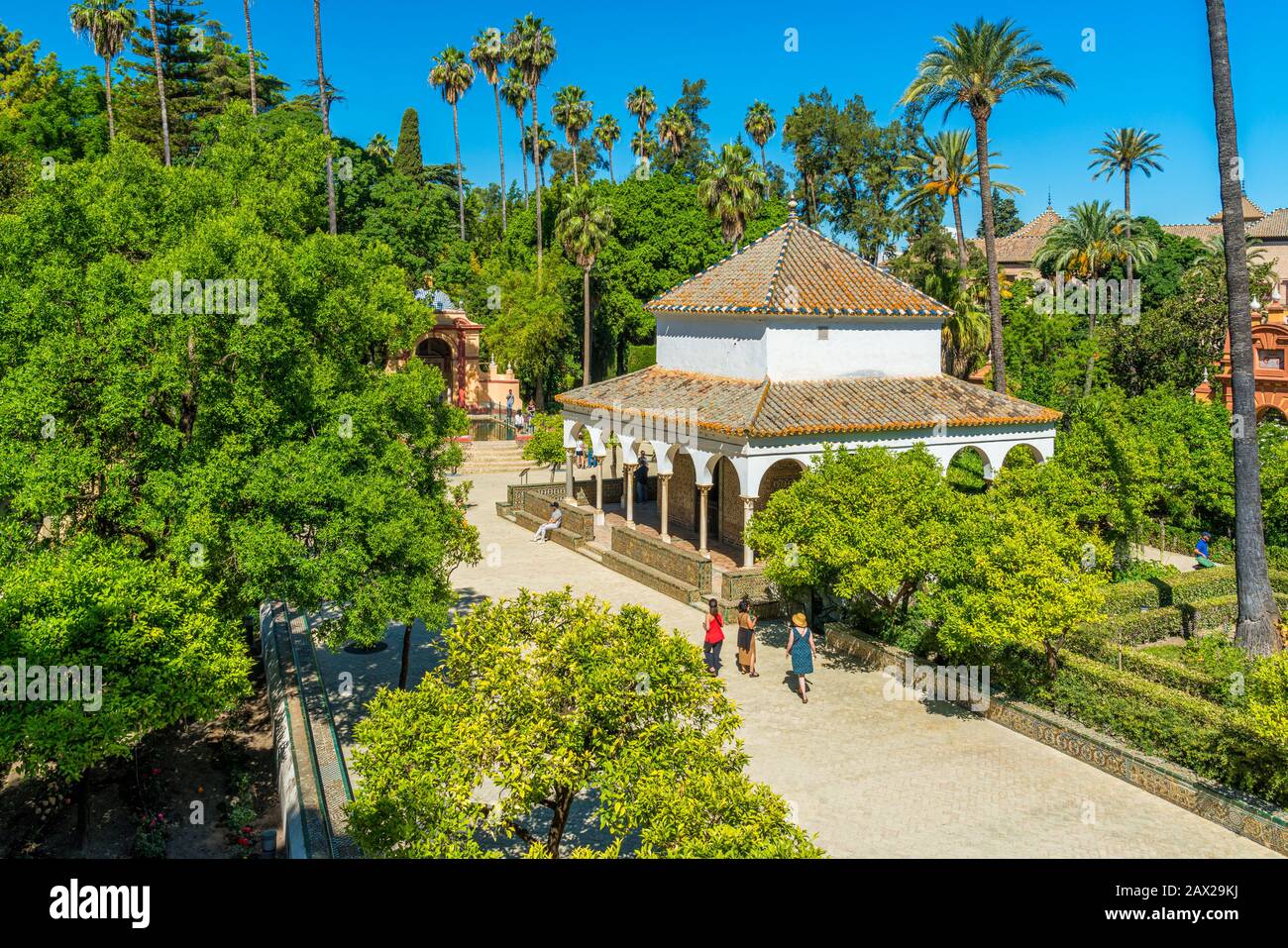 The idyllic garden in the Royal Alcazars of Seville, Andalusia, Spain. Stock Photo