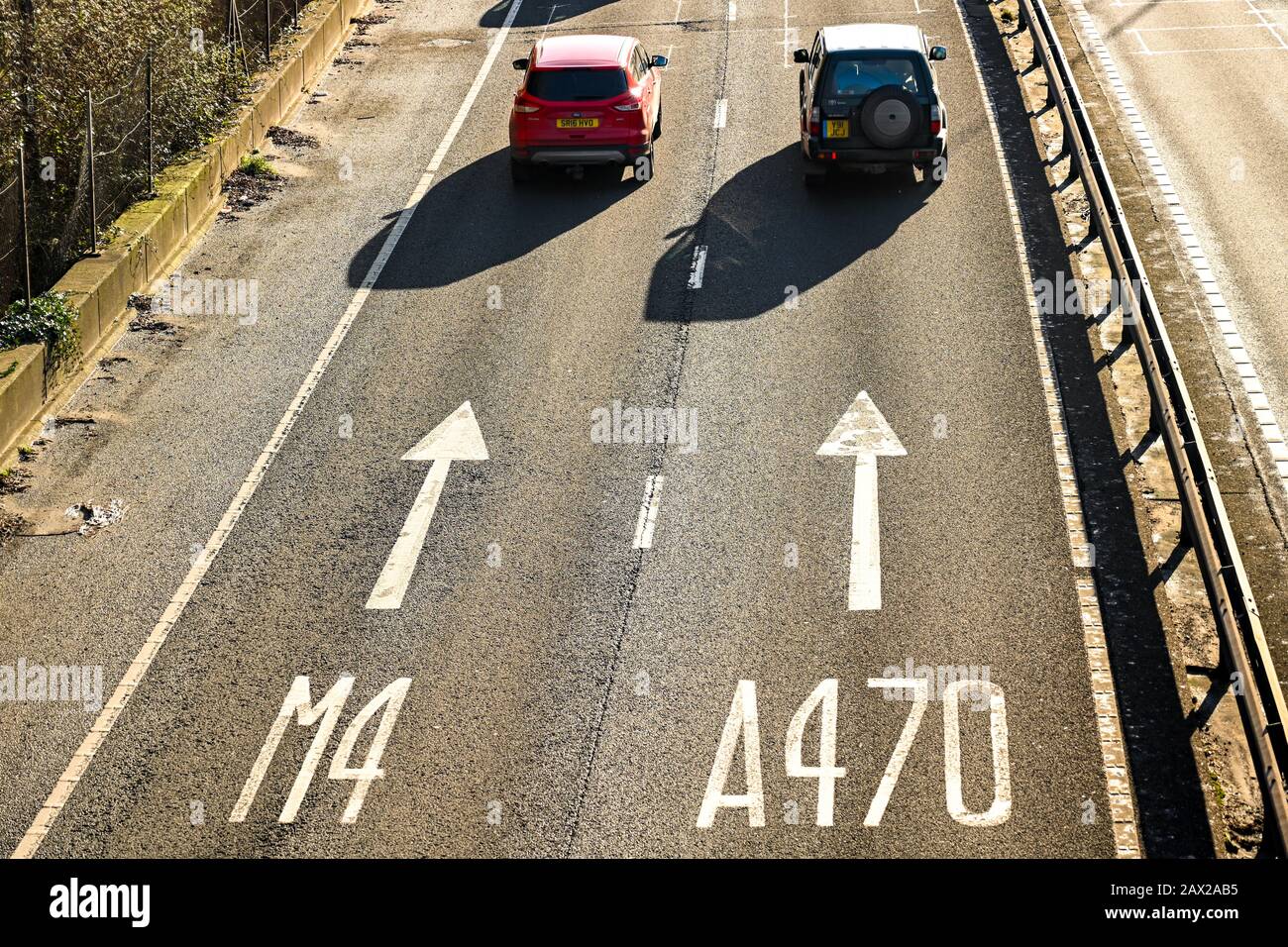 TAFFS WELL, NEAR CARDIFF, WALES - JUNE 2018: Aerial view of trafic and lane markings on the A470 trunk road at Taffs Well heading towards Cardiff. Stock Photo