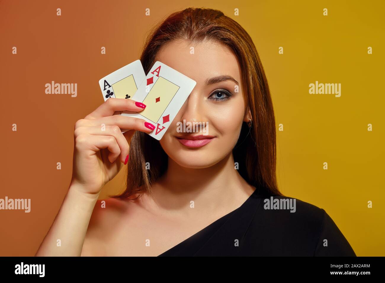 Gorgeous Blonde Girl With Bright Make Up Red Manicure In Black Dress Has Covered Her Eye With Two Playing Cards Smiling Posing On Colorful Backgro Stock Photo Alamy