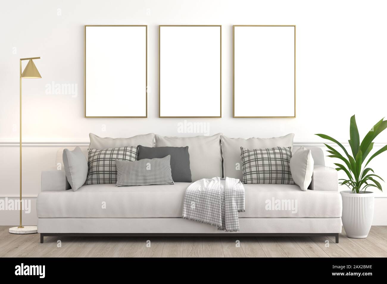 Interior design setup, modern elegant living-room consisting of white couch with various pillows and textiles, lamp and plant on a pot on white wall w Stock Photo