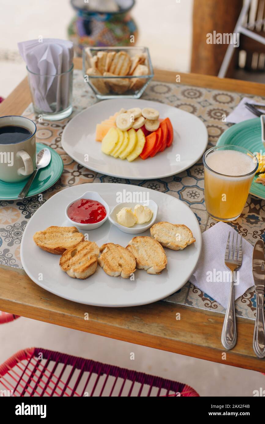 breakfast in the hotel with toast and fruit Stock Photo Alamy