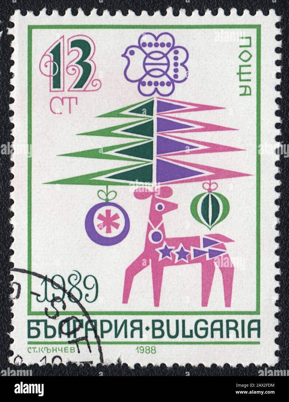 Postage stamp:  The New Year stylized drawing with a deer,fir tree, Bulgaria, 1989 Stock Photo