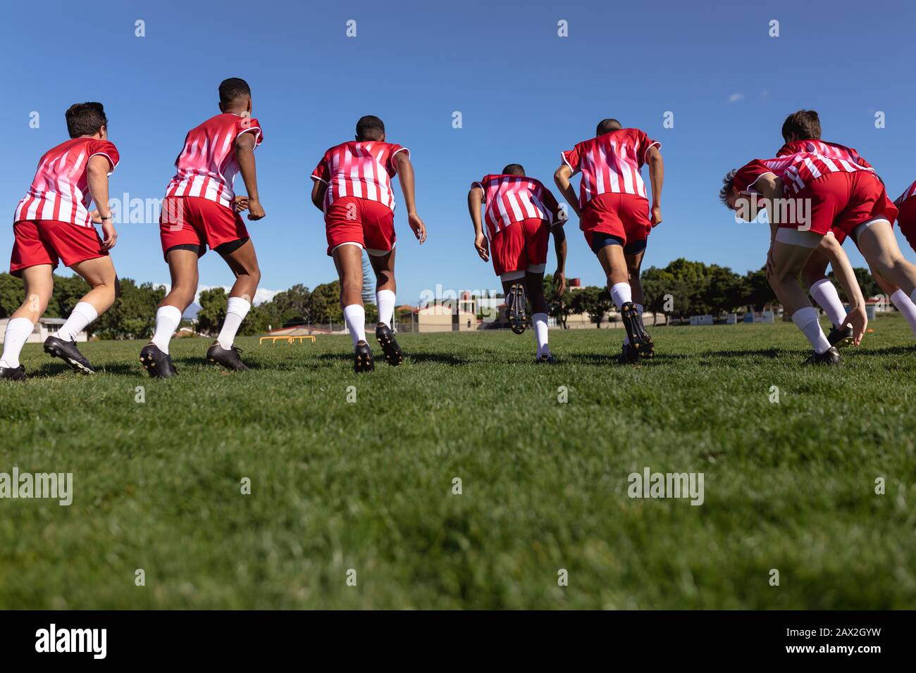 Rugby players running Stock Photo Alamy