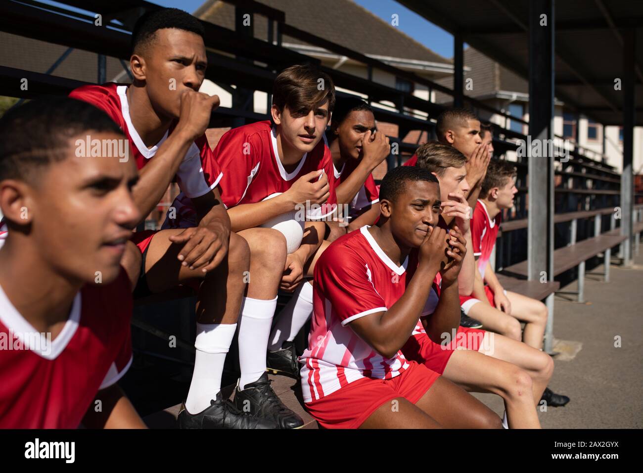 Rugby team on the benches Stock Photo