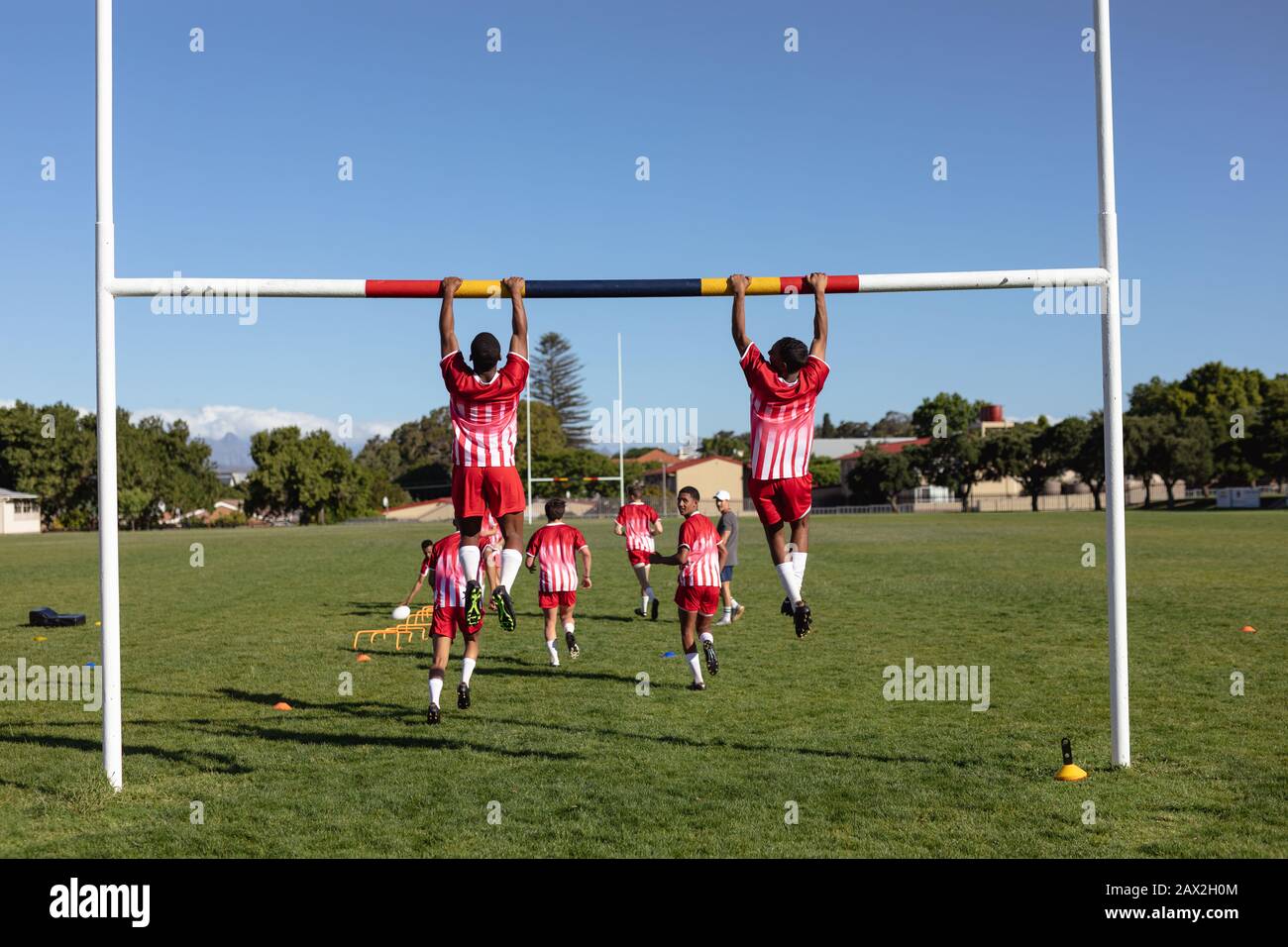 Rugby players doing pushups Stock Photo Alamy